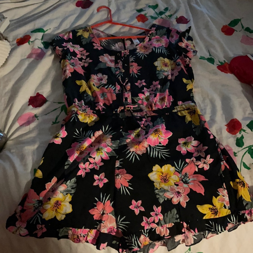 Tropical floral justice romper only worn once